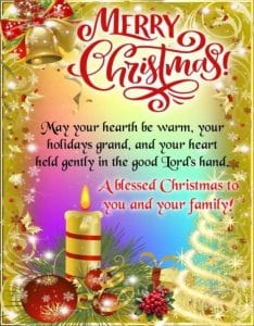 Christmas candles glowing on window sill